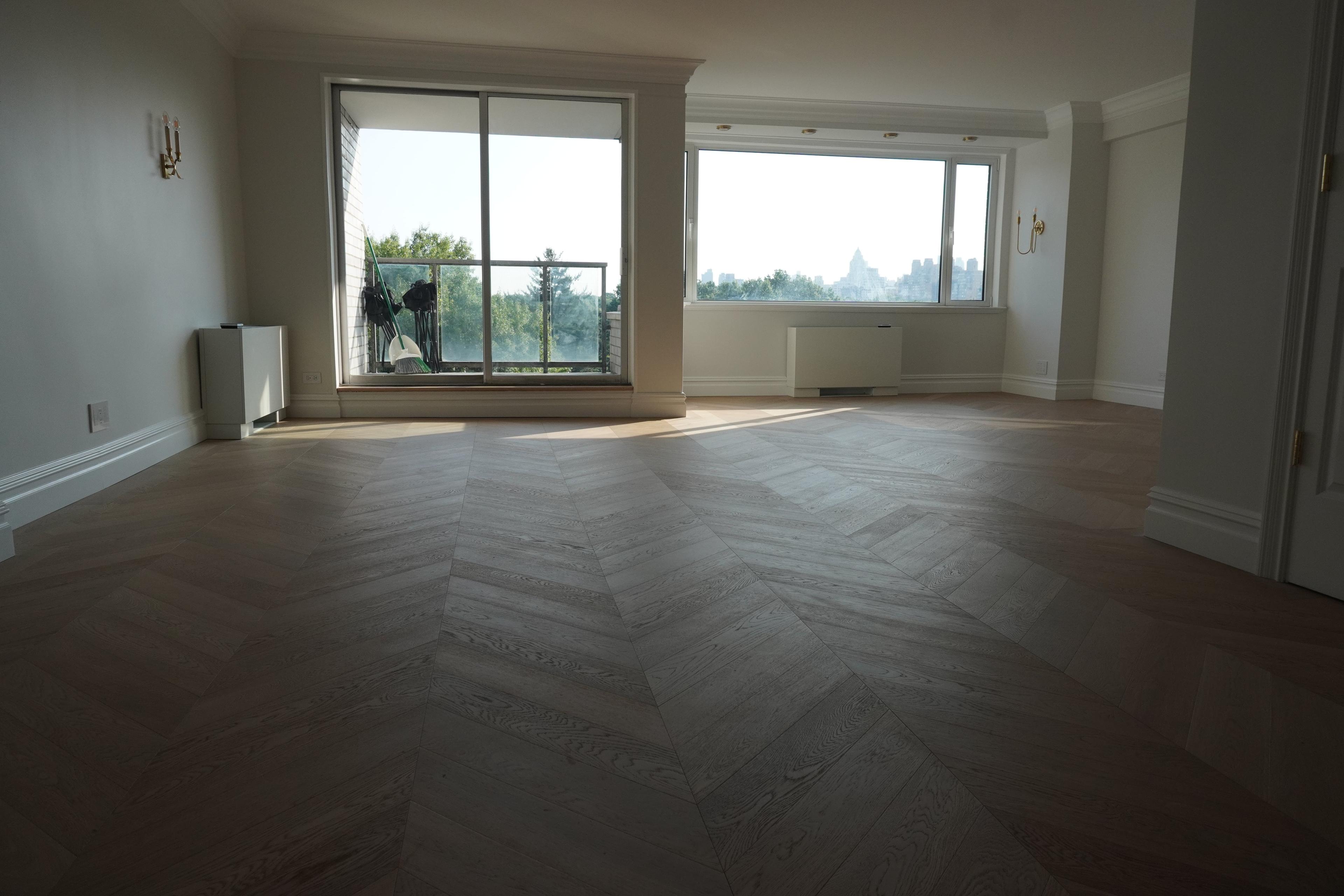Chevron hardwood floor facing the park at 116 Central Park South