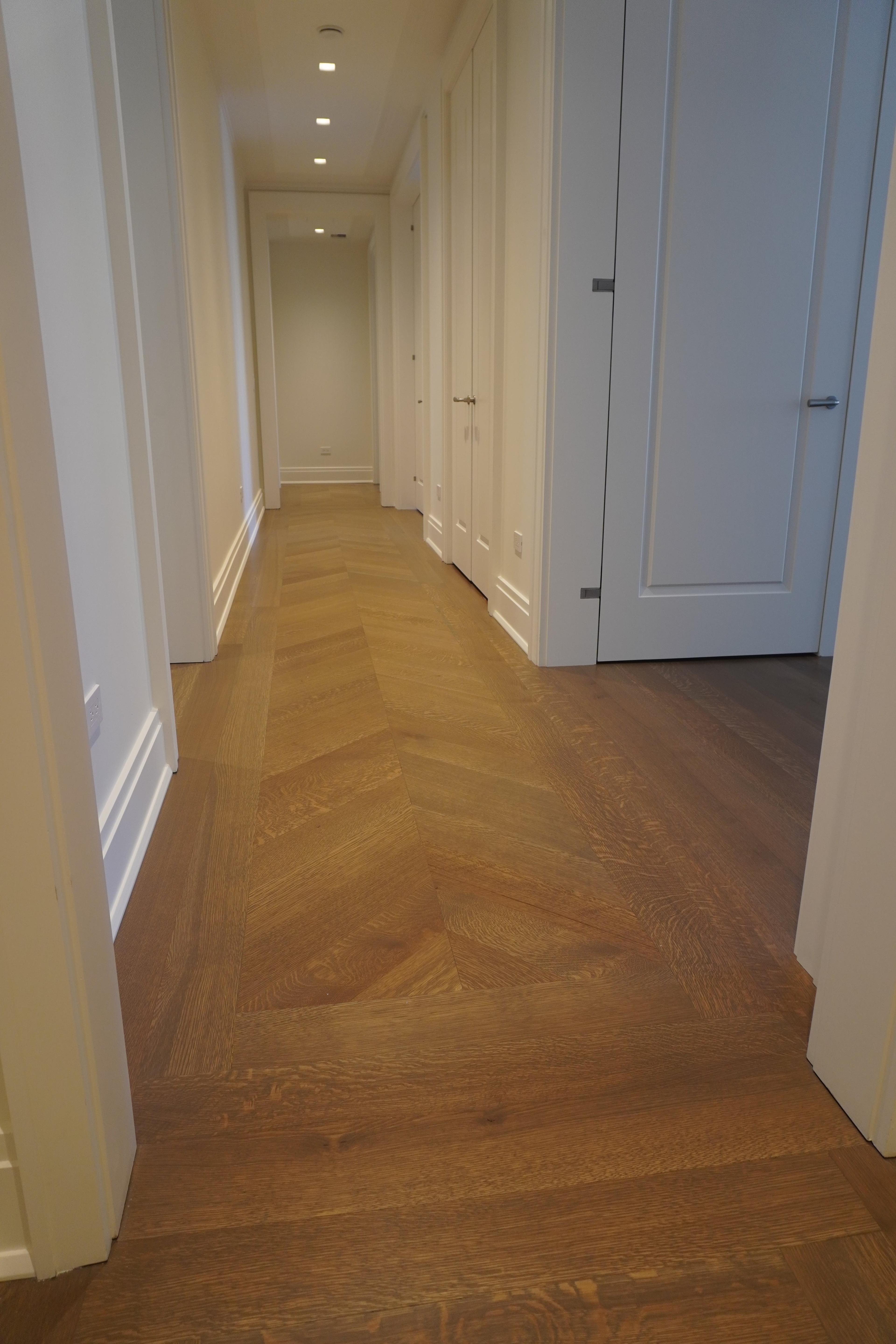 Chevron hardwood hallway at the Belnord Apartment Upper West