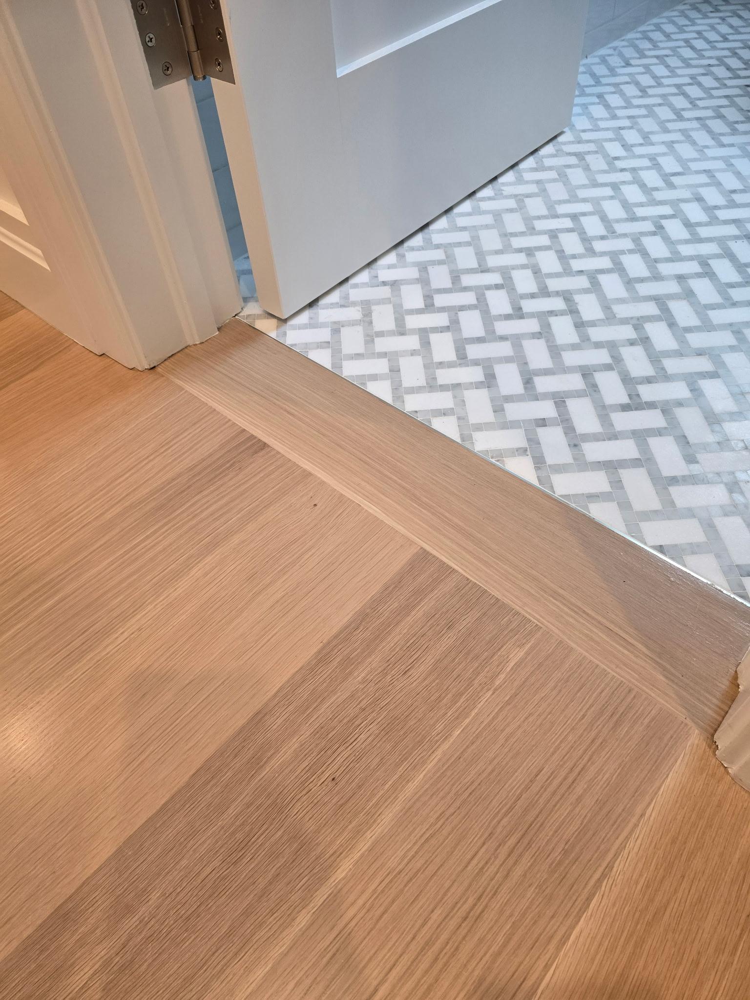 Hardwood-to-tile threshold at Roslyn Heights