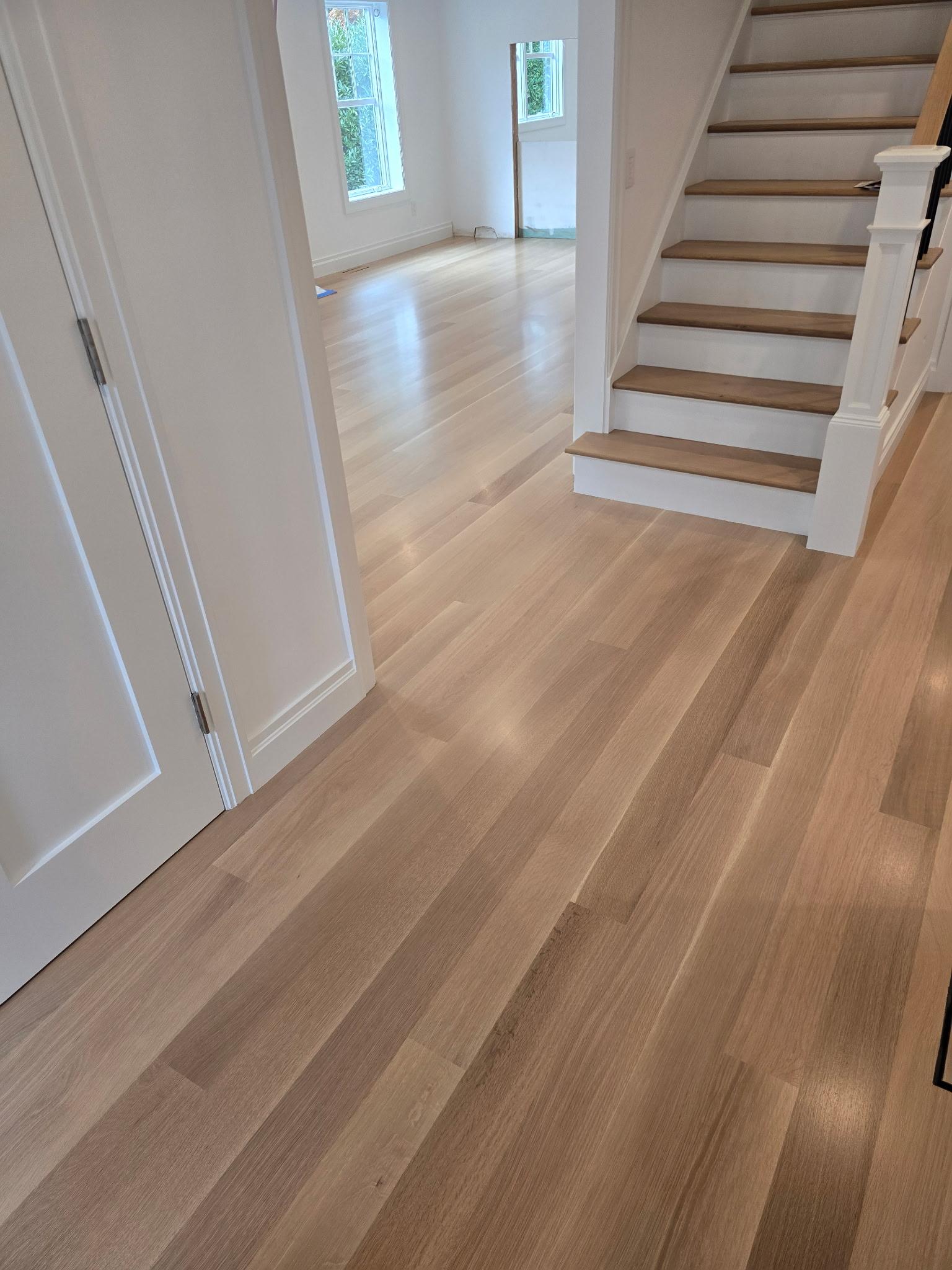 Light hardwood floor and stair at Roslyn Heights