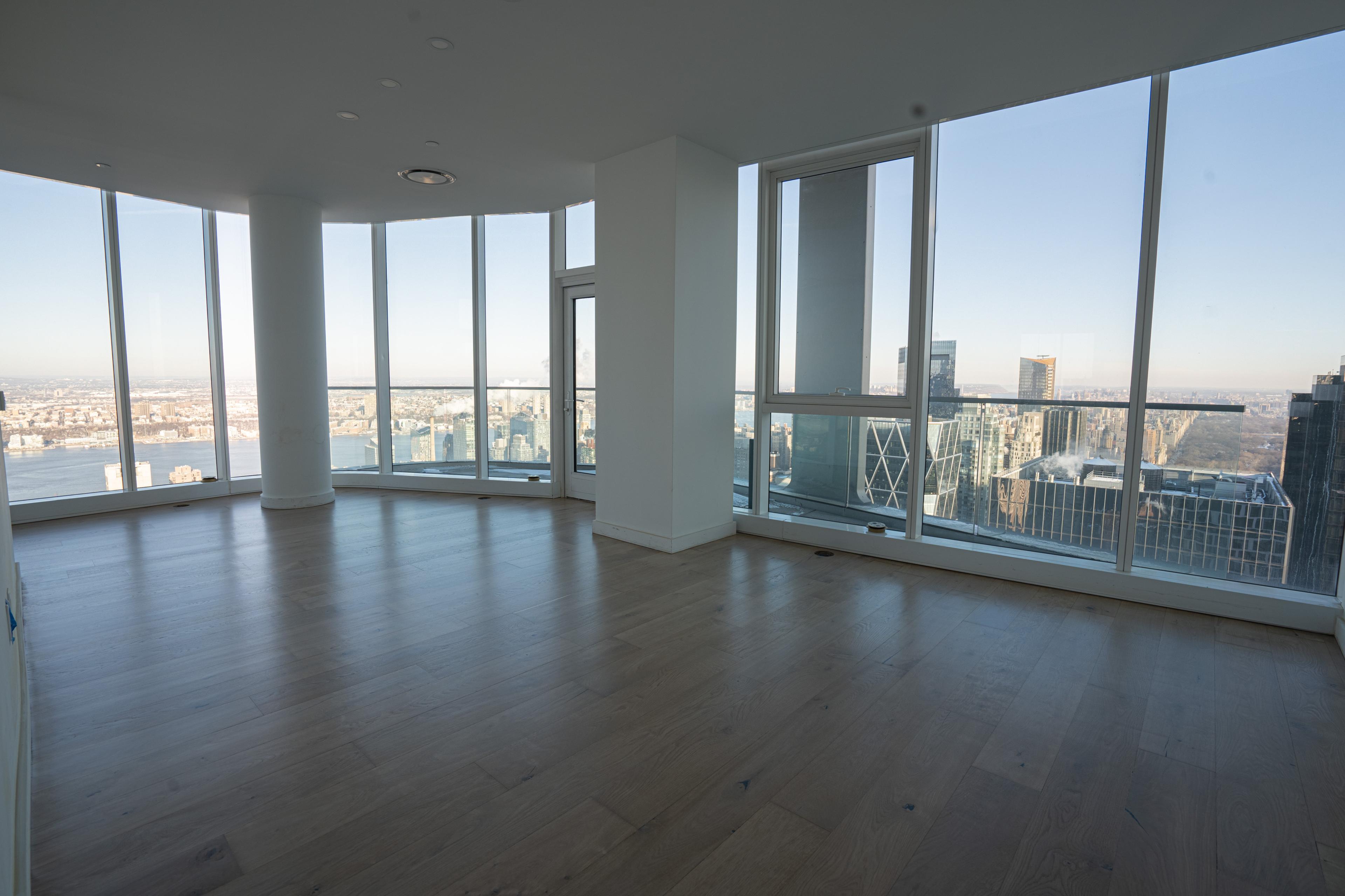 Wide-plank hardwood in the living room at The Aro