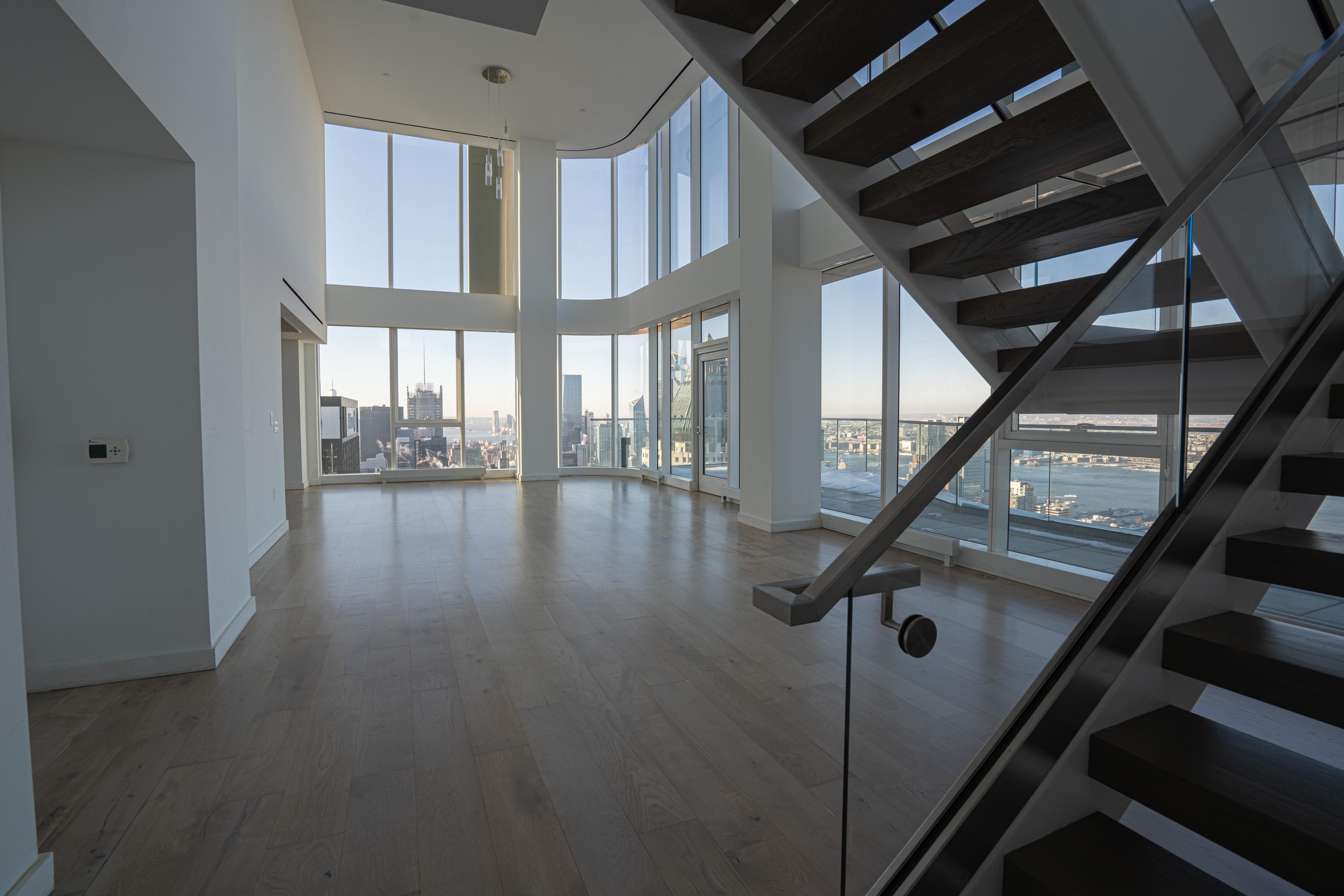 Hardwood floor beside the stair at The Aro