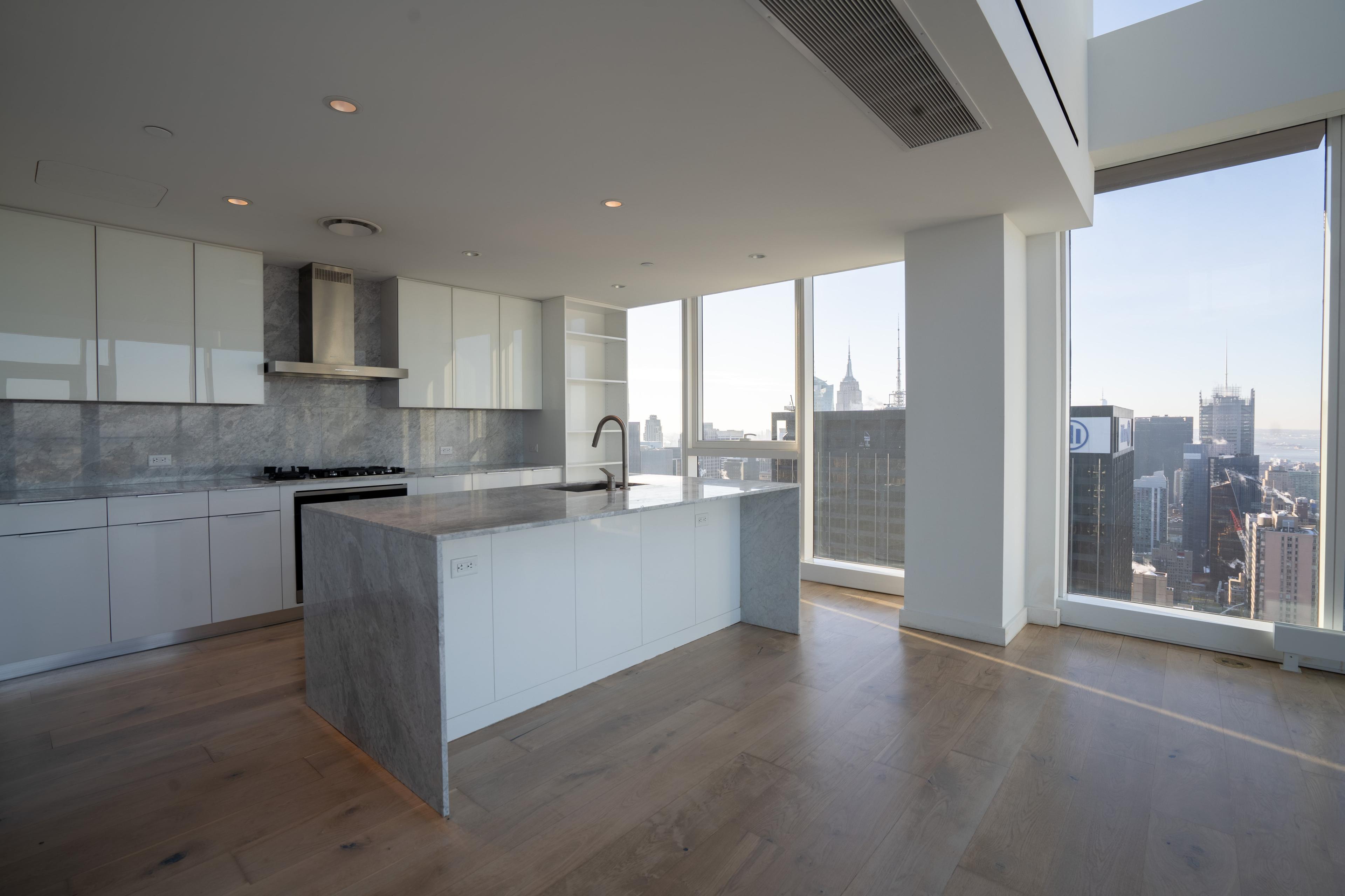 Hardwood floor running through the kitchen at The Aro